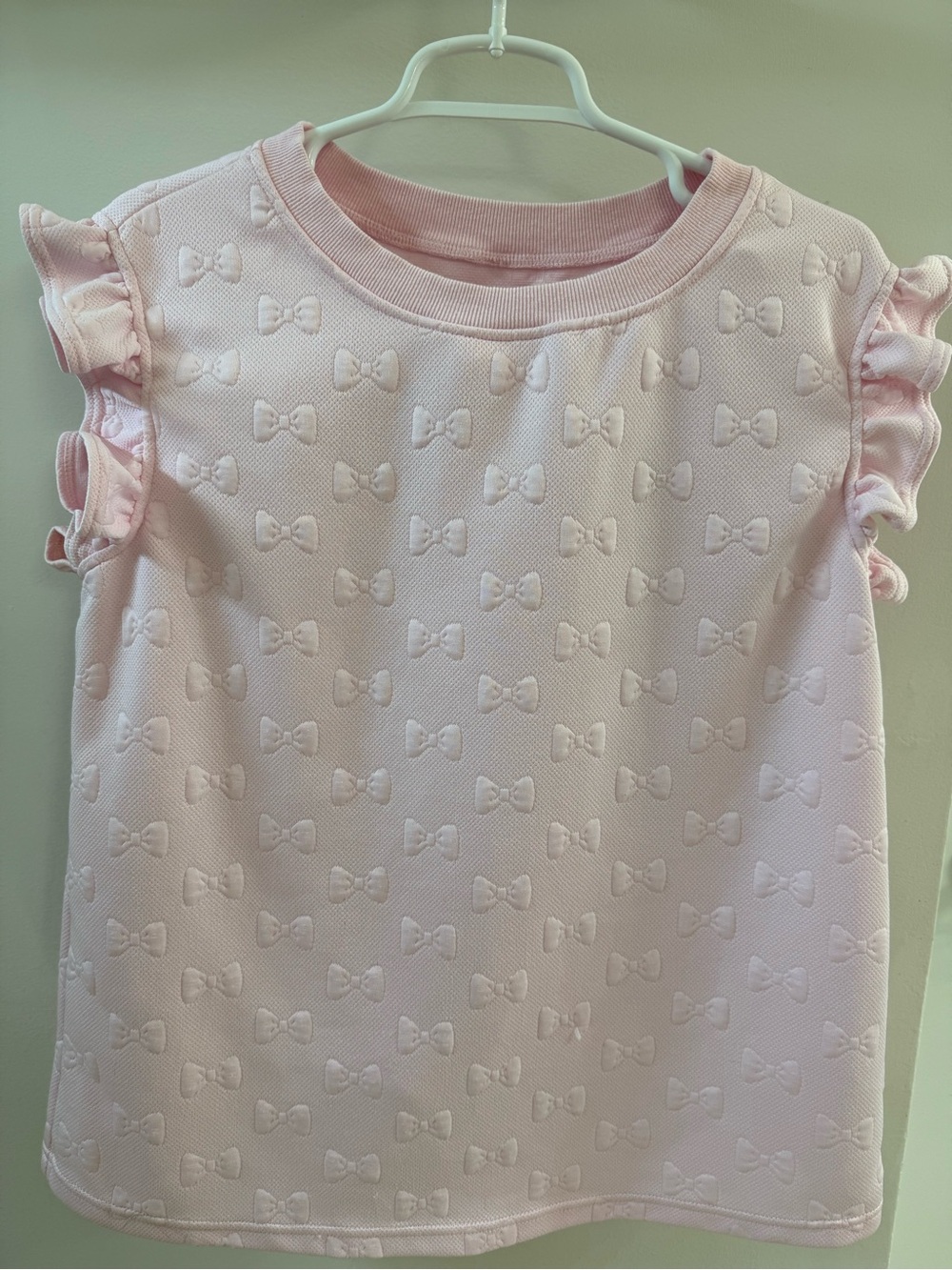 Pink Bow-Textured Ruffle Sleeve Top and Shorts set.